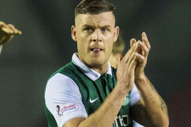 Hibs striker Anthony Stokes salutes the fans at full-time