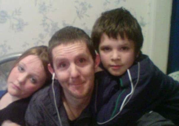 Paul Forsyth with his daughter, Amy, and son Ian. Pic: Contributed