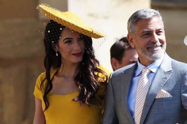 Amal and George Clooney will be in Edinburgh today. Pic: PA