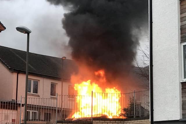 The Audi was set alight on Harperrig Way. Picture: Jason Rust/TSPL