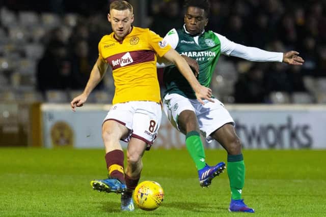 Stephane Omeonga will likely come up against Motherwell's Allan Campbell once more. Picture: SNS Group