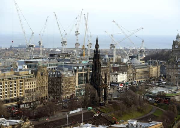 Cranes dominate the Capitals skyline as business does the heavy lifting. Picture: Lisa Ferguson
