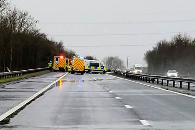 Police and emergency services on the scene at the site of the crash. Picture: Police Scotland