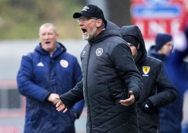 Hearts manager Craig Levein, clearly frustrated, delivers orders