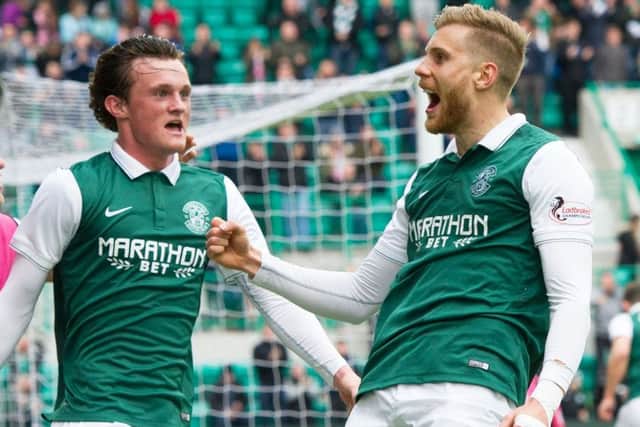 Liam Henderson and Gunnarsson celebrate the latter's goal against Queen of the South. Picture: SNS Group