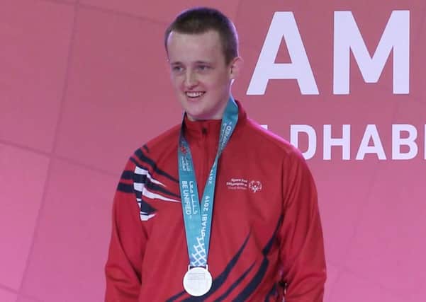 Special Olympics GB athlete Harrison Lovett collects his silver medal in the Judo at the ADNEK in Abu Dhabi, at the Special Olympics World Games. Pic: PA