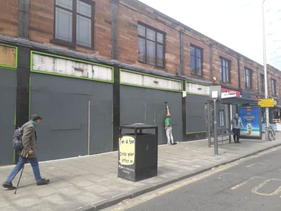 Developers Drum board up empty shops on Leith Walk.
 Pic:  Martina Cannon-Ball from Save Leith Walk