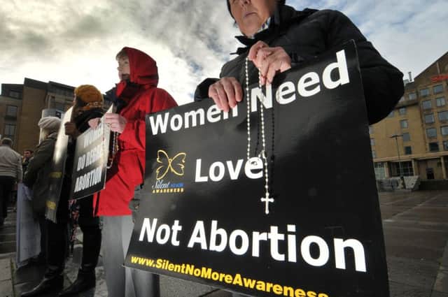 Protestors from the 'silent no more awareness' froup stand on Lothian road to make their feelings known about abortion. Pic: Jon Savage/TSPL