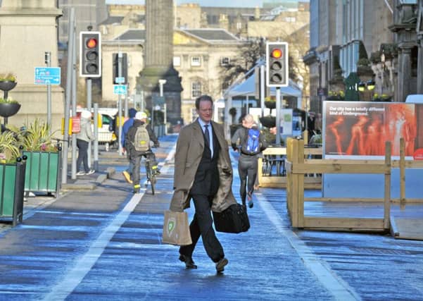 Pedestrians on traffic-free sections of George Street, Edinburgh. Picture: Jane Barlow/TSPL