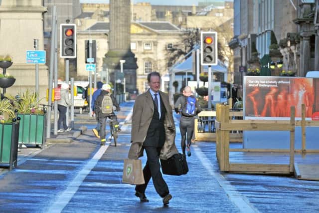 Pedestrians on traffic-free sections of George Street, Edinburgh. Picture: Jane Barlow/TSPL