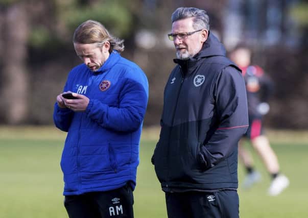 Hearts manager Craig Levein and his assistant Austin MacPhee oversee training. Pic: SNS