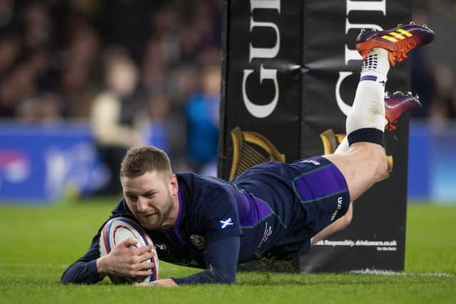Finn Russell goes over for Scotland's fifth try at Twickenham. Picture SNS/Bill Murray