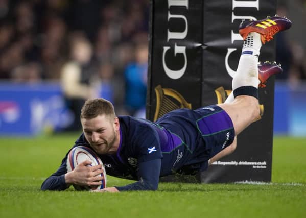 Finn Russell goes over for Scotland's fifth try at Twickenham. Picture SNS/Bill Murray