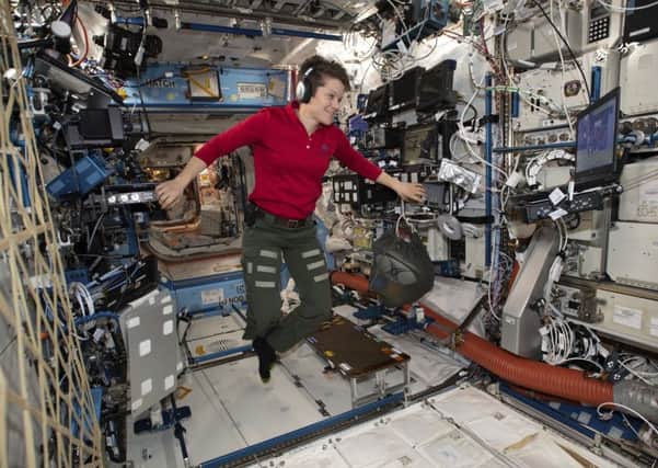 Flight Engineer Anne McClain, seen in International Space Station, was supposed to do a spacewalk yesterday but her suit was too large (Picture: Nasa via AP)