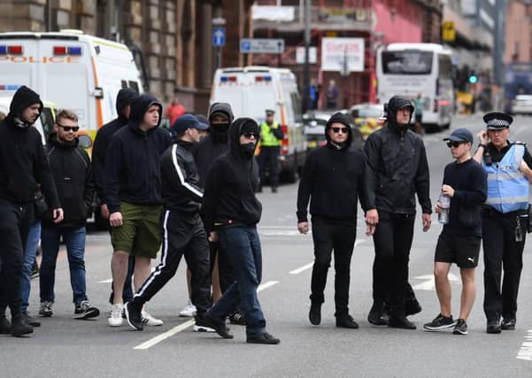 Police dealt with an SDL protest in Glasgow last summer. Picture: TSPL