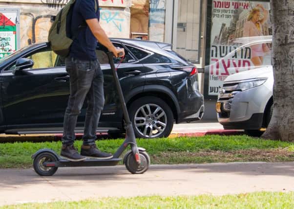 Electric scooters on pavements pose a potential conflict with pedestrians. Picture: Getty Images