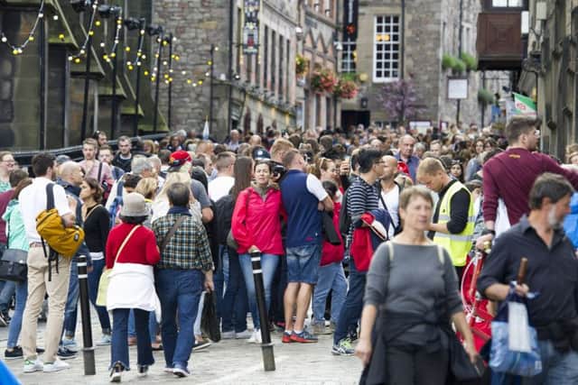 Tourists on the Royal Mile/High Street, Edinburgh during the 2017 Edinburgh International Festival.