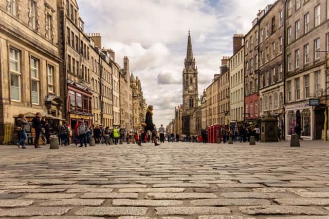 Edinburgh residents in the city centre are to be put at the heart of a new tourism strategy. Picture: Alicia Garcia