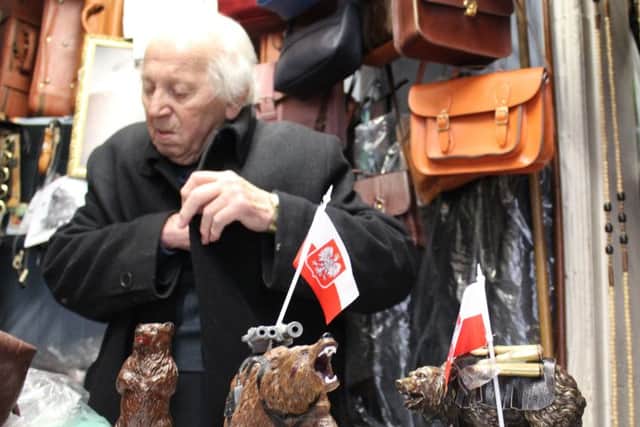 The 92 year old surrounded by leather bags in his Leather Goods shop on Lauriston Street, where he still works. Picture: Megan Merino