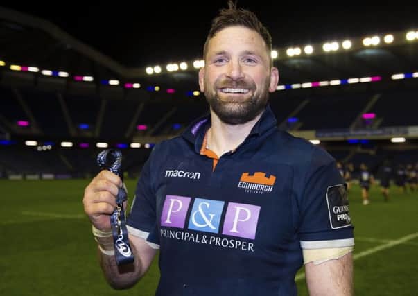 Edinburgh's John Barclay is awarded the Man of the Match award at full-time. Picture: Ross Parker/SNS