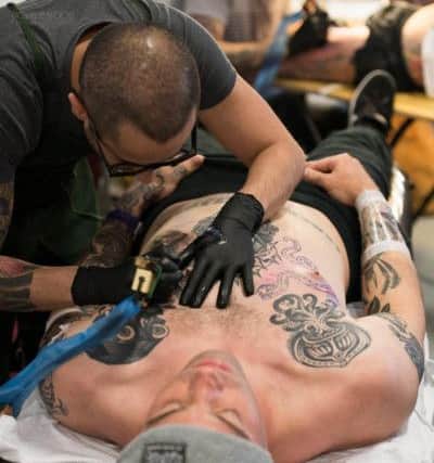 Tattoo artists will be descending on Edinburgh this weekend.