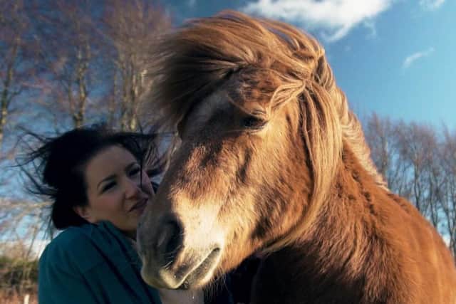 Shirley Reise with her family's chestnut Shetland Pony, Winnie
