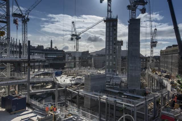 Construction on the new site will include a hotel , cinema, residential accommodation, car parking for 1600 cars and open spaces for shows.