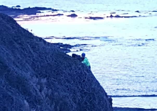 The teen being rescued. Pic: North Berwick Coastguard Rescue.