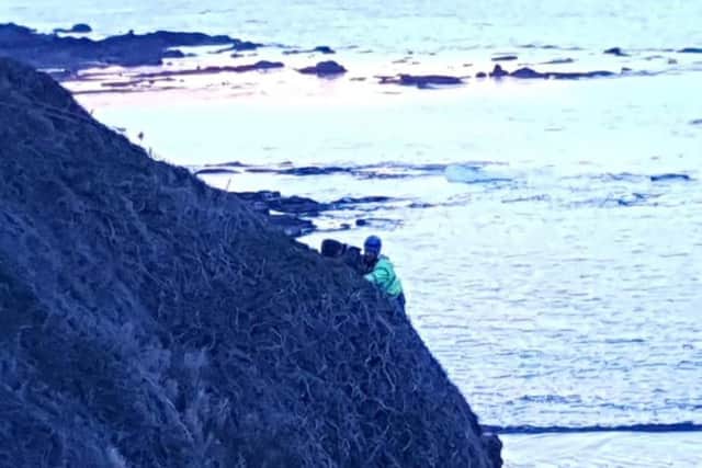 The teen being rescued. Pic: North Berwick Coastguard Rescue.
