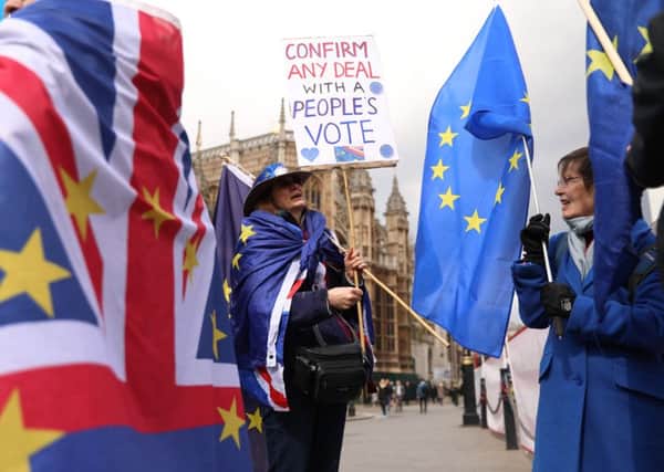 Pro-EU campaigners calliing for a Peoples Vote protest outside the Houses of Parliament. Picture: AFP/Getty