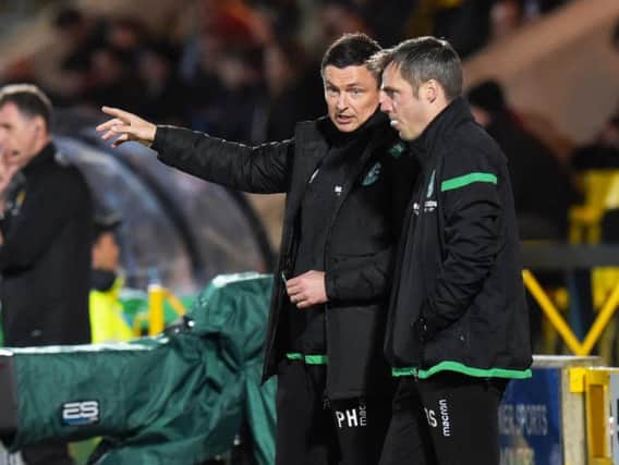 Paul Heckingbottom speaks with assistant boss Robbie Stockdale during the 2-0 win.