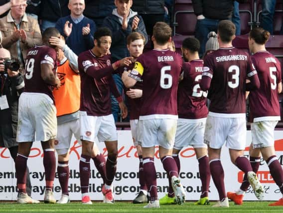 Hearts fans were delighted with the team's win. Picture: SNS