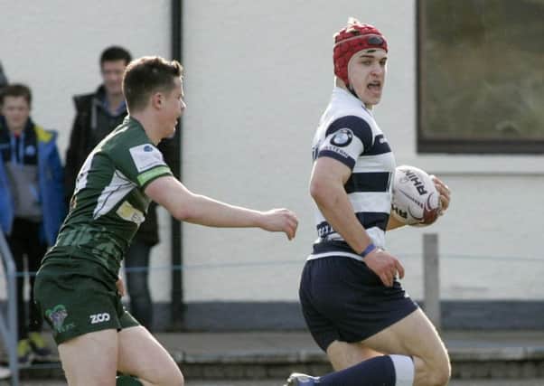Heriot's Jack Blain on way to a try against Hawick. Pic: Alistair Linford