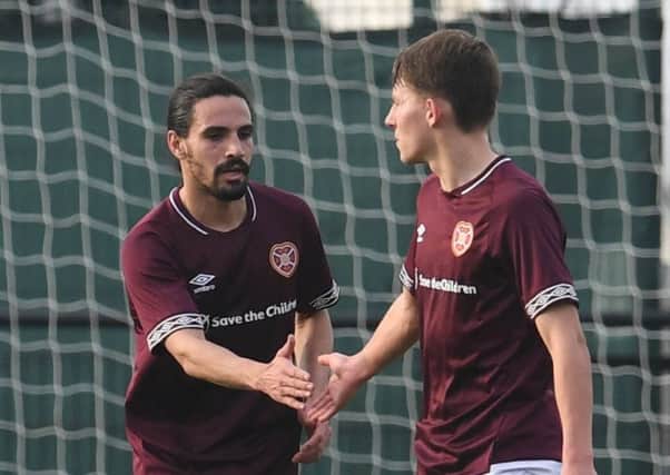 Ryan Edwards scored twice against Aberdeen as Hearts clinched their place in the final