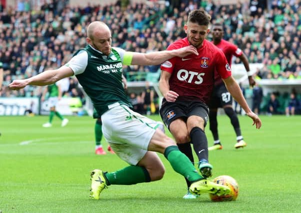 David Gray (left) competes with Kilmarnock's Greg Taylor during Hibs' 3-2 win back in September. Picture: SNS