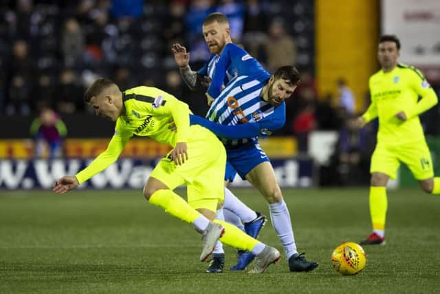 Florian Kamberi tangles with Kirk Broadfoot during the last meeting between the two sides. Picture: SNS Group