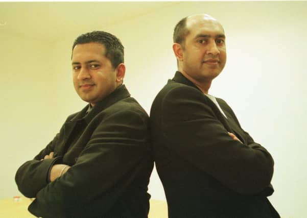 Sunny Tuli (left) and brother Raju at their Jean Scene store in Livingston.