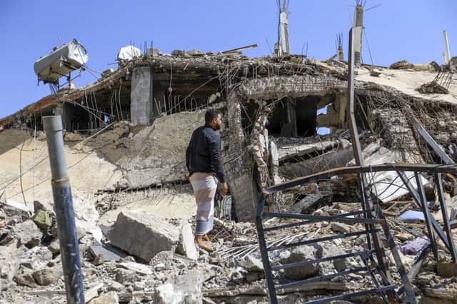 A Yemeni man goes through the wreckage of a building that was reportedly destroyed in a Saudi-led coalition air strike in the capital Sanaa on September 5, 2018. Pic: Mohammed Huwais/AFP/Getty Images