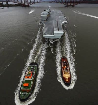 HMS Queen Elizabeth returns to Rosyth for planned maintenance.