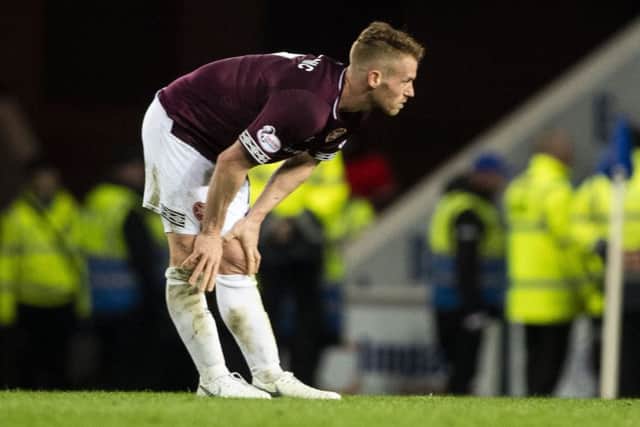 Oliver Bozanic is dejected after Hearts go down 3-0 to Rangers at Ibrox. Picture: SNS Group