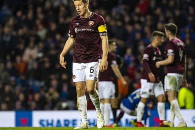 Christophe Berra can't hide his disappointment as Hearts go down to Rangers. Picture: SNS Group