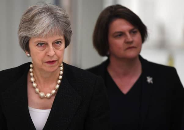 Powerbrokers: Theresa May and DUP leader Arlene Foster (Picture: Clodagh Kilcoyne/AFP/Getty)