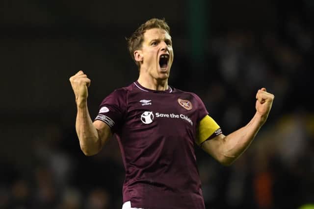 Christophe Berra celebrates at the end of Hearts' 1-0 win over Hibs in December. The Jambos are unbeaten in three derbies. Picture: SNS Group