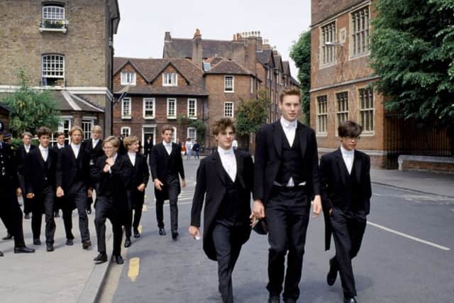 Eton schoolboys in traditional tails at Eton College. Pic:  Tim Graham/Robert Harding/REX/Shutterstock
