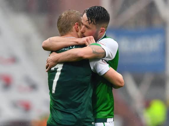 Marc McNulty hugs Hibs' goalscoring hero Daryl Horgan