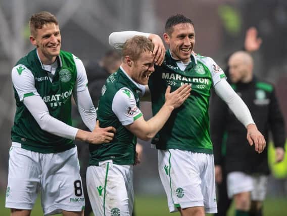 Hibs players celebrate their win over Hearts. Pic: SNS