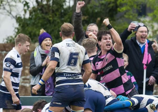 Tommy Spinks punches the air after Ayr scored a try on their way to a 29-23 win over Heriots