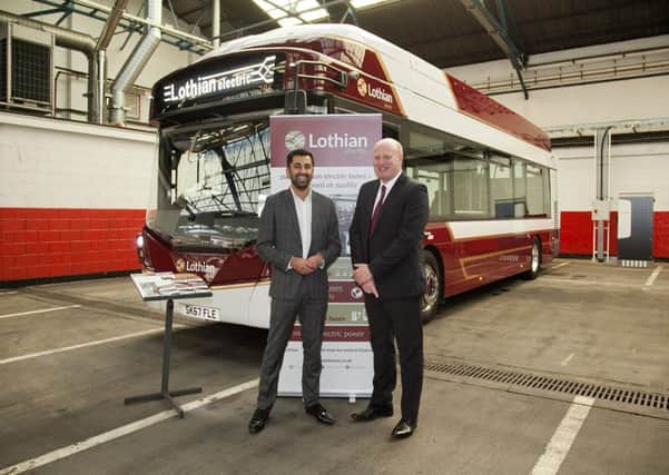 Richard Hall, Managing Director of Lothian buses with then Transport Minister, Humza Yousaf