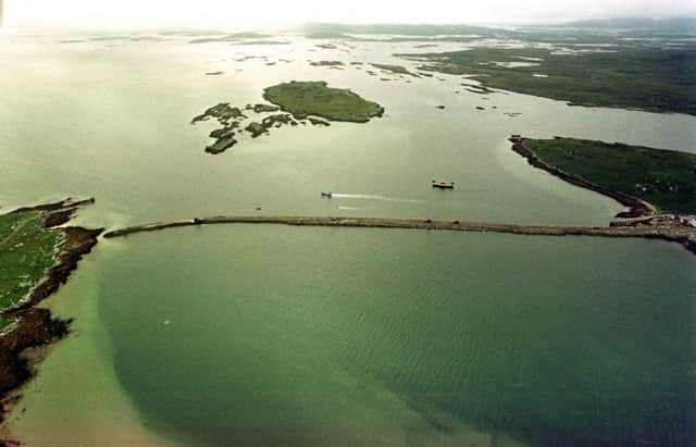 The Berneray causeway from  North Uist (right) to  Berneray (left)spreads out from Otternish over the Coalas Bhearnaraigh for  920 metres. It was officially opened 30 years ago this week. PIC: TSPL.