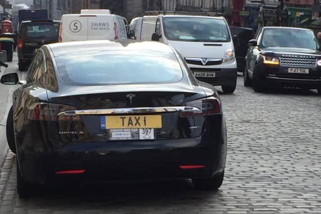 Edinburgh's Most Expensive Private Hire Car?

Tesla (approx £50k) with personlised plate seen in the High Street, Edinburgh